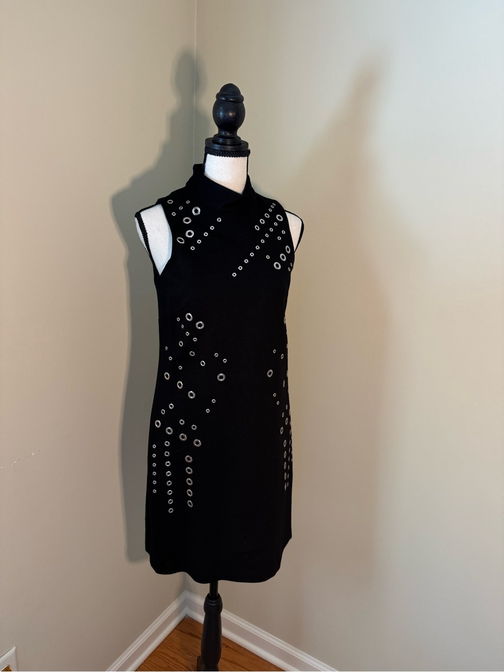 Black Sleeveless Mini Dress with Silver Grommet Embellishments